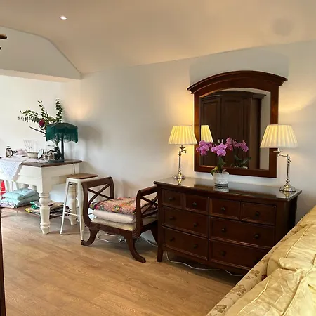 Tig Fuchia * Doonsheane